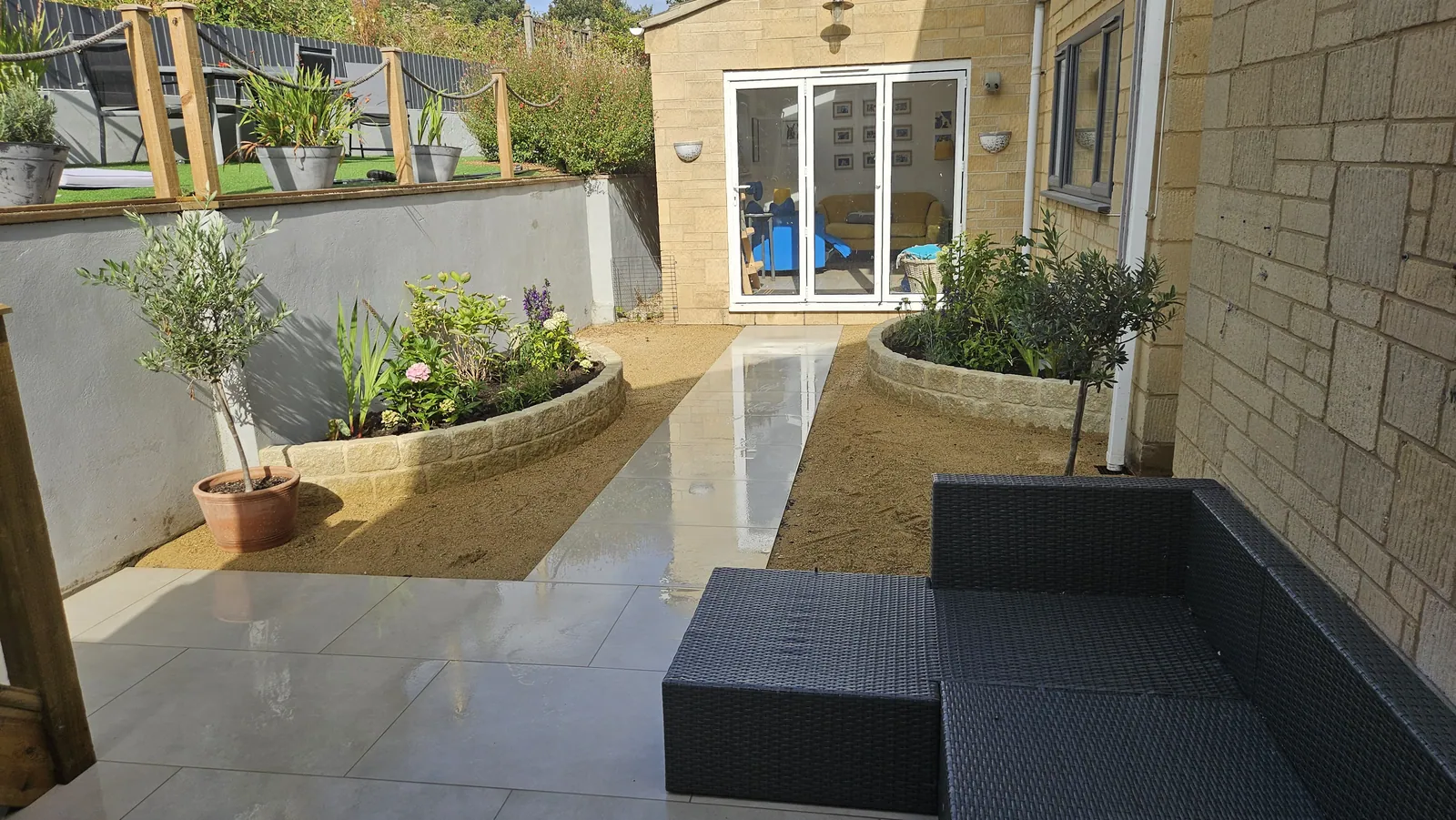 Curved Patio with Planting Beds – Bath